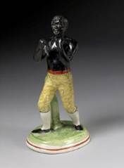 Illustration 3&nbsp;: Figurine en faïence émaillée au plomb représentant le boxeur Tom Molineux.