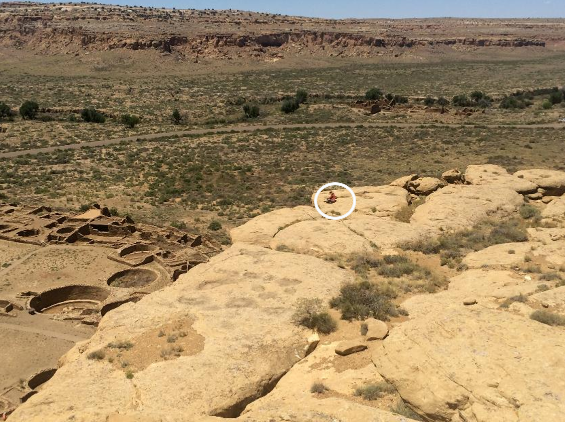 Figure 21. Chaco Canyon. Author looking at Pueblo Bonito. Photo courtesy Todd Johnson.
