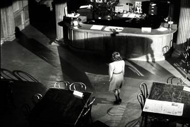 Fig. 2: Young Charlie alone in the public library [59:00]